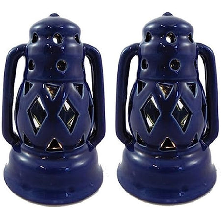 2 identical dark blue lantern lights with cut out shapes to let the LED lights shine through.