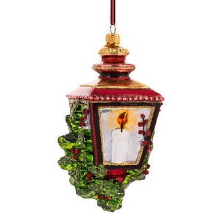 Blown glass ornament of 
red lantern with candle and holly berries