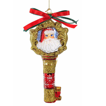 Blown glass golden key ornament with an image of Santa's face and red ribbon.