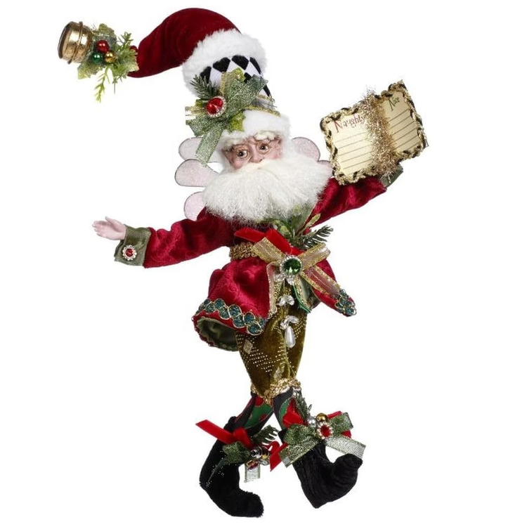 Decorative Christmas figure of a fairy in red and green attire with a white beard, holding a list.