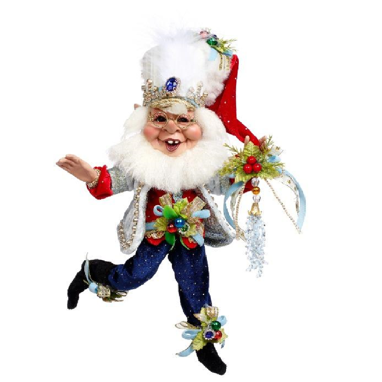 Decorative figure of an elf in festive attire with a white beard and colorful decorations on a white background.