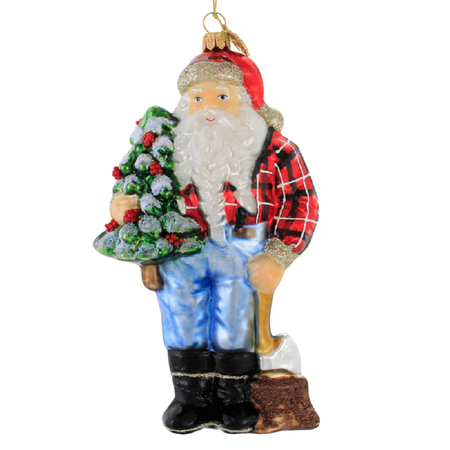 A vintage-style Christmas ornament depicting a Santa Claus figure dressed as a lumberjack, holding a decorated Christmas tree and a shovel, on a plain white background.