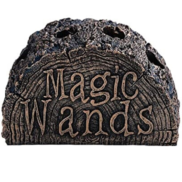Wand stand made to look like a half cut log with the words Magic Wands and holes to stand up wands