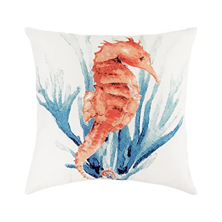 White square pillow with an orange seahorse in front of blue coral.