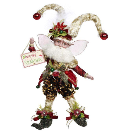 Decorative Christmas fairy figurine with a 'Merry Christmas' sign on a white background