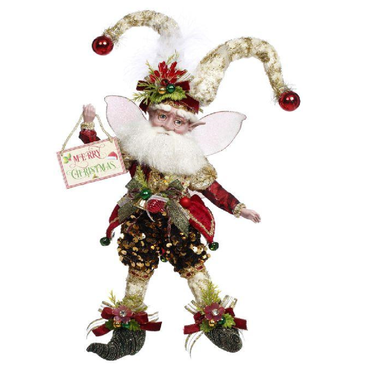 Decorative Christmas fairy figurine with a 'Merry Christmas' sign on a white background