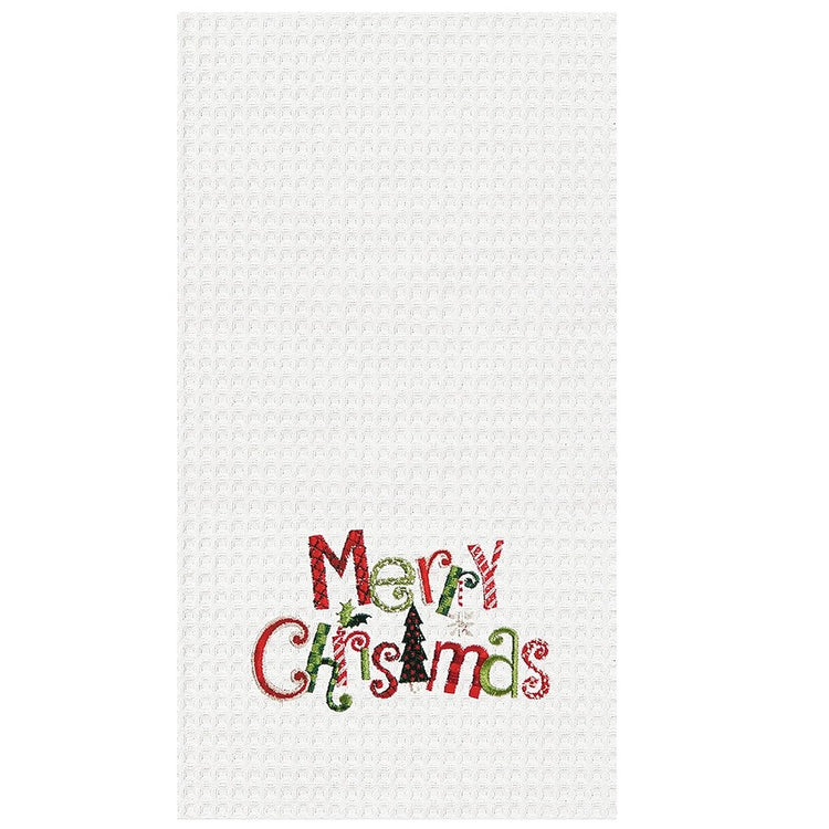 white waffle weave hand towel with the words Merry Christmas embroidered in festive red white and green.