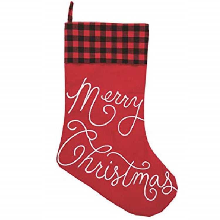 Red Christmas stocking with red and black buffalo check cuff and white embroidered text "Merry Christmas".