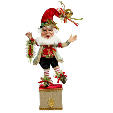 bearded elf figurine with jingle bells, on a box with a hook for a stocking.