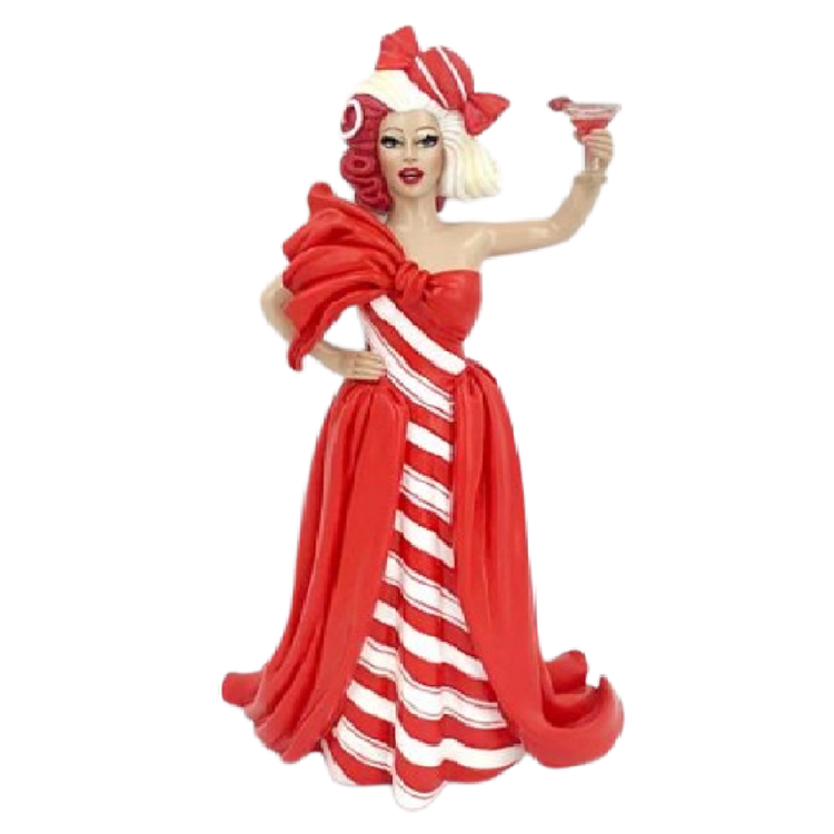 drag queen styled ornament, her wig is red and white, her hat looks like a peppermint candy and her dress red and white striped.