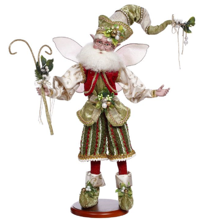 bearded fairy in green and red outfit, holding a staff and mistletoe springs