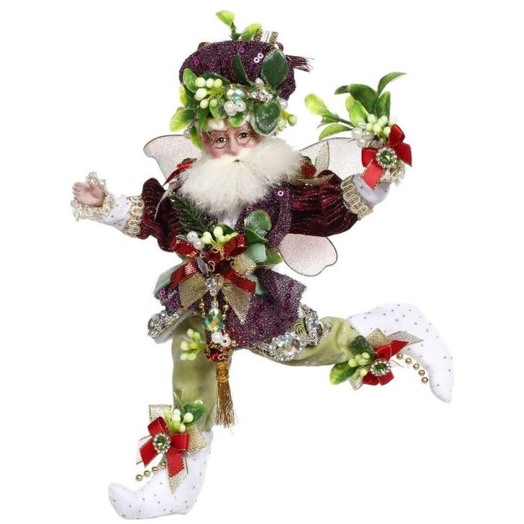 bearded fairy in a dark purple sequined coat and matching hat adorned with mistletoe sprigs.