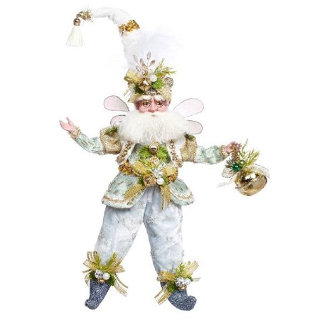 Decorative fairy figure with white hat and green outfit on a white background