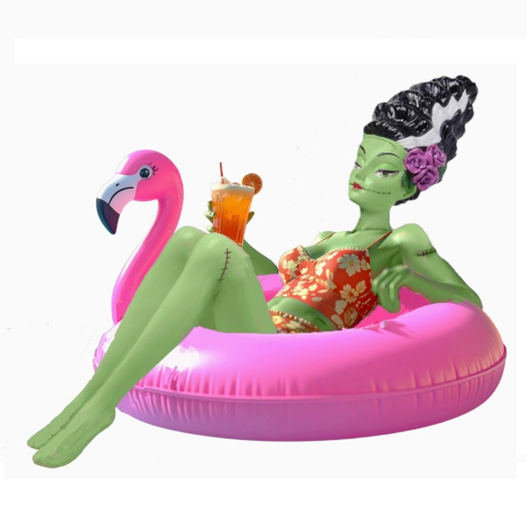 Monster Bride figurine sitting in pink flamingo float made of resin 12 inches 