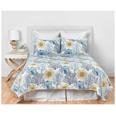 King size quilt and two pillow shams, white with a blue and yellow coral pattern and dark blue jellyfish pattern.