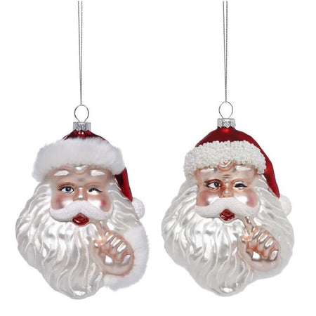 two blown glass santa head ornaments, one with a fur trim and one with bead trim.