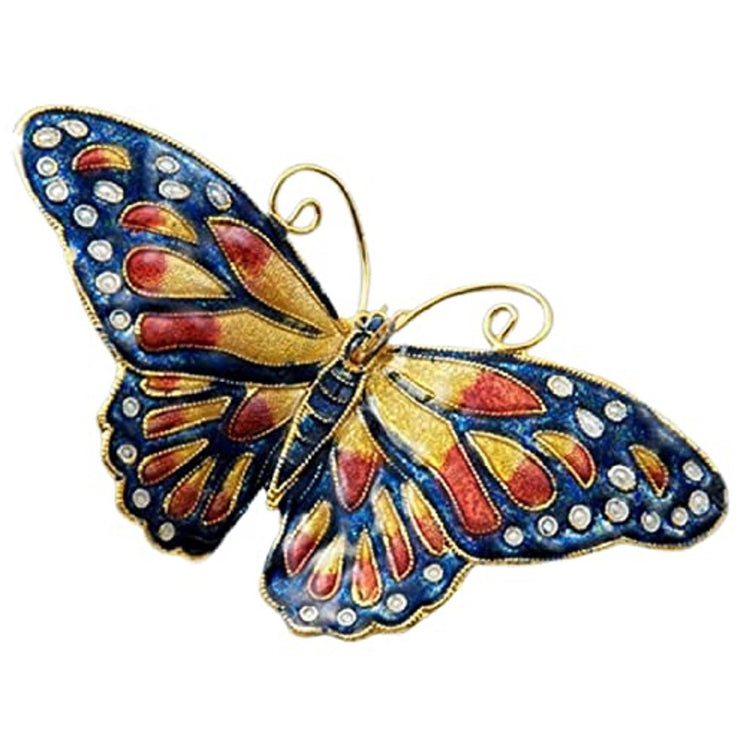 butterfly ornament in navy blue, orange with gold accent.
