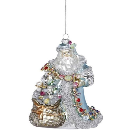 blown glass Santa ornament in long blue coat and holding a gold sack of jewels.