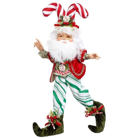Christmas elf figurine with candy cane hat and striped pants on a white background