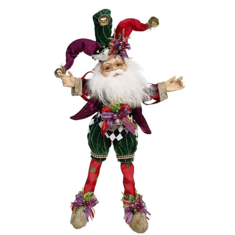 bearded elf wearing red, green and purple outfit and matching jester hat with jingle bells.