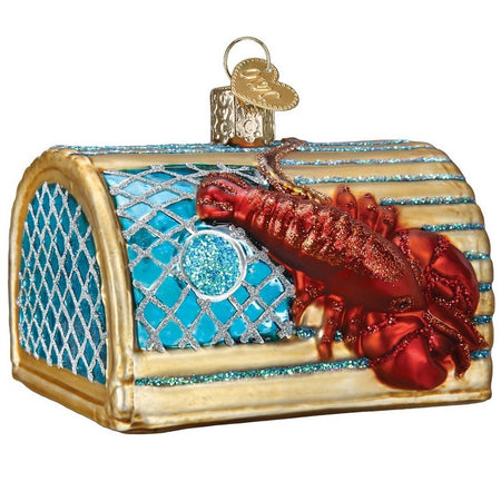 blown glass ornament of a lobster trap with a lobster.