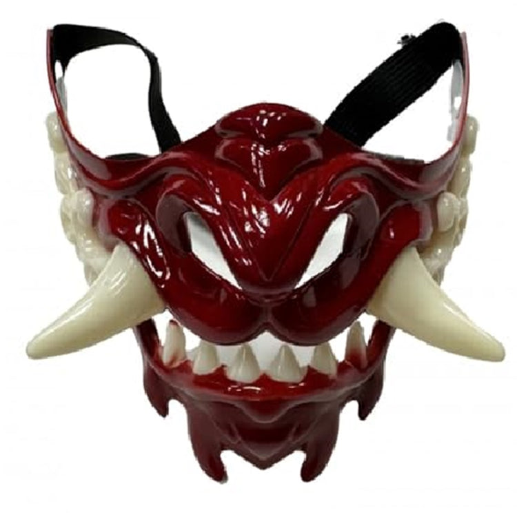 Red mask with large white teeth and black straps.