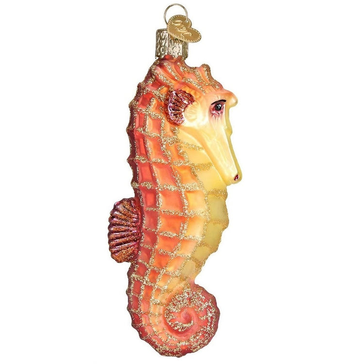 blown glass orange seahorse ornament with s hook and storage box.
