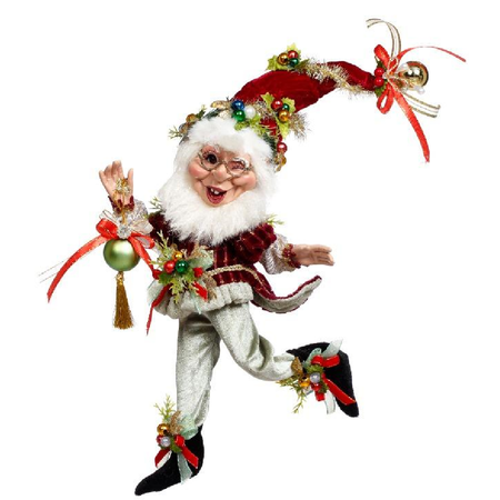 Bearded elf figurine wearing festive red hat and jacket, holding an ornament