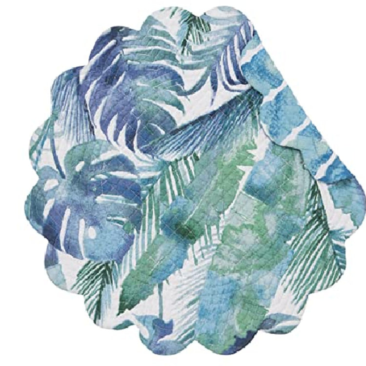 round scalloped quilted placemat in shades of blue and green tropical leaes