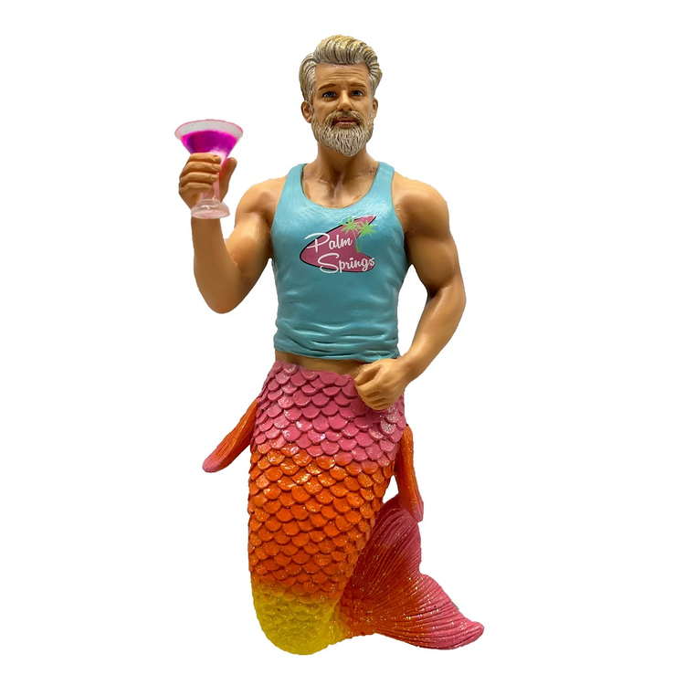 blonde merman with pink, orange and yellow tail,  blue tank top that says "palm springs and holding a cocktail.