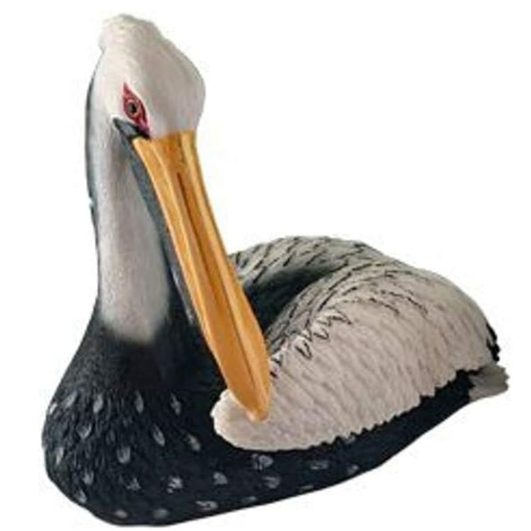 Sitting pelican figure with dark grey bocy and white wings