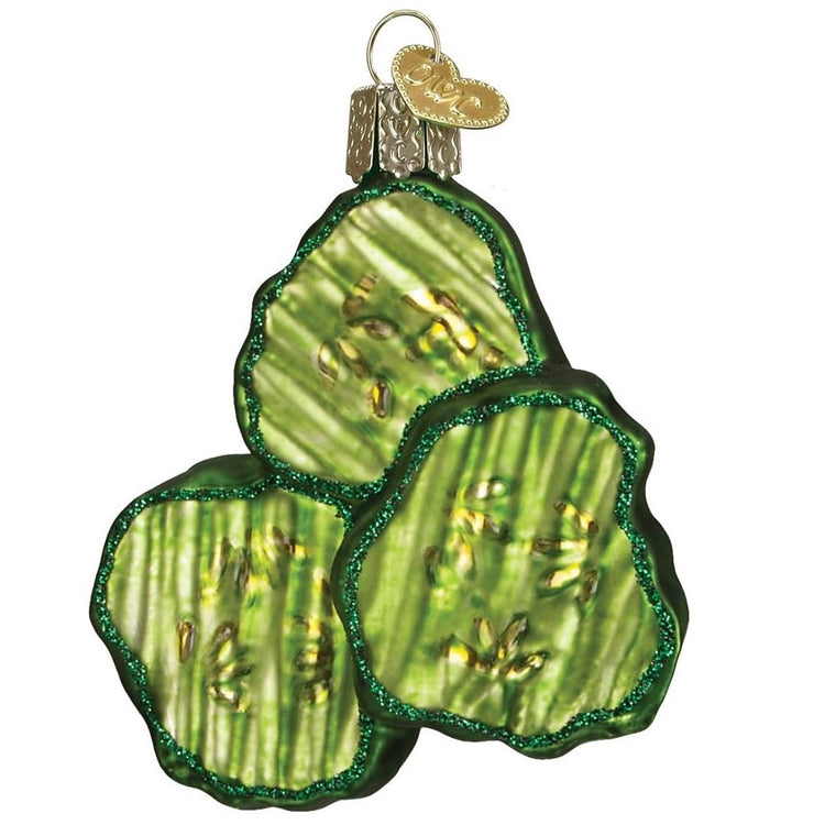 Blown glass ornament of 3 pickle chip slices, with glitter accents.