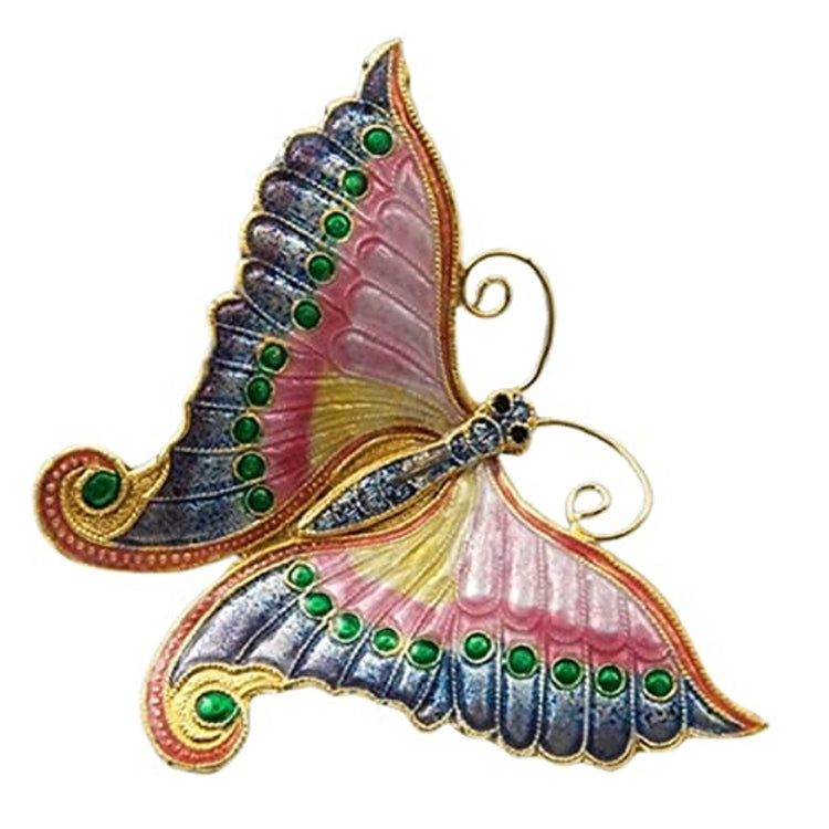 butterfly ornament with shades of pink and blue. Green and yellow accents