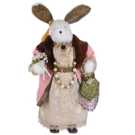 fabric bunny figurine in a white lace dress and pink coat.