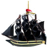 wooden pirate ship hanging ornament with black sails skull crossbones and red flag