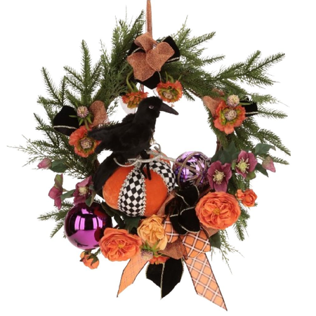 wreath with orange and pink flowers, black and orange ribbons, and a crow sitting on a pumpkin.