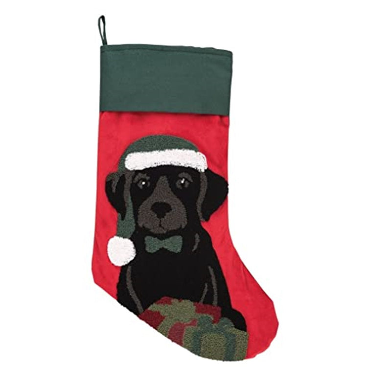 Red stocking with green cuff.  Embellished with a black lab puppy and a red and green present.