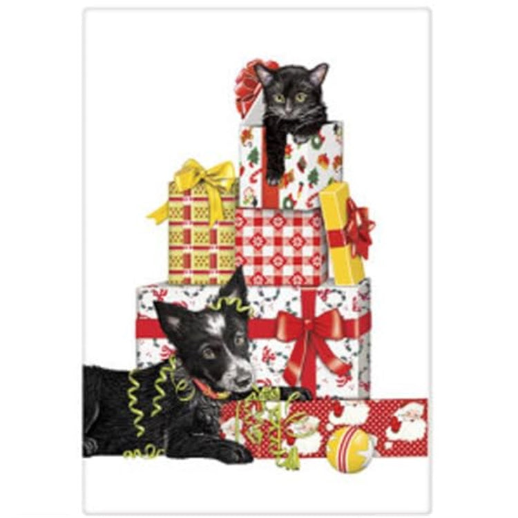 Folded white kitchen towel with stacks of presents and a cat and dog .