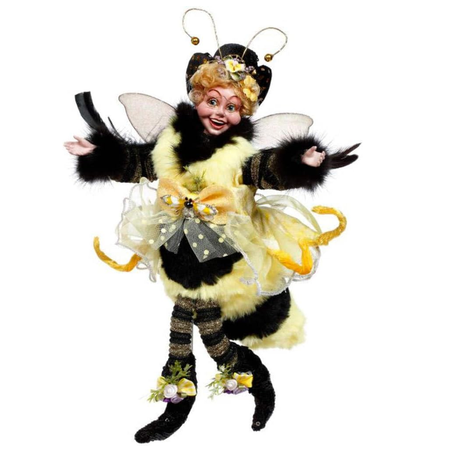 fairy girl wearing black and yellow fuzzy bee costume.