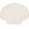 Quilted placemat in white, shaped like a scallop shell.