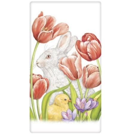 white flour sack towel with image of a white rabbit sitting among pink tulips.