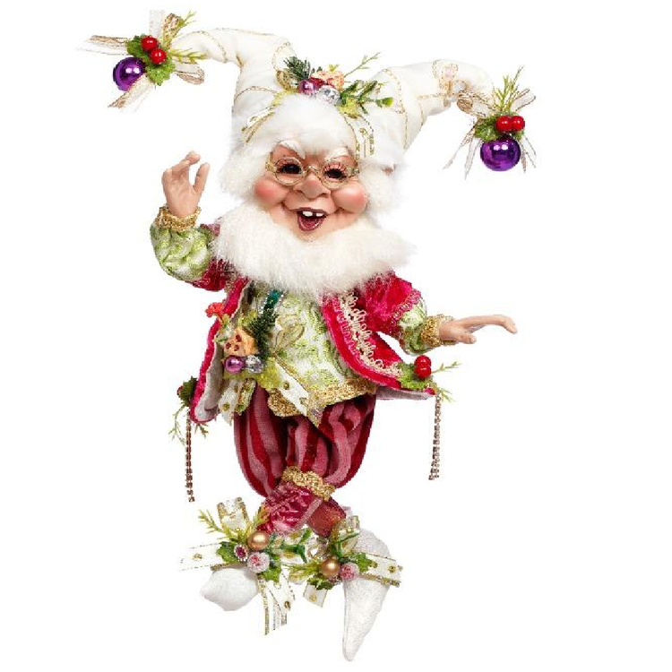 Bearded elf figurine wearing pink outfit, white jester hat with berries.