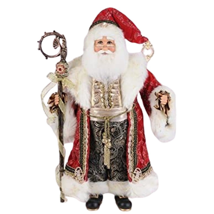 Standing Santa figurine holding a staff with ribbon accent.  He wears a fur trimmed red coat has a full beard and a red santa hat.  Black fur trim pants and black boots with gold buckles