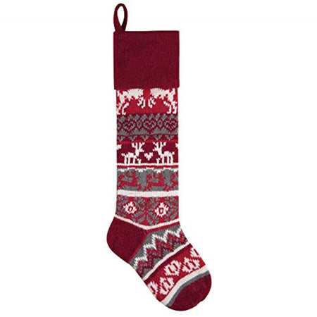 Knit stocking in red and white with reindeer prints