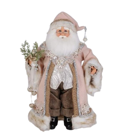 Santa figurine in brown pants with a silver vest, a rose pink long coat and matching hat, both trimmed in fur. 