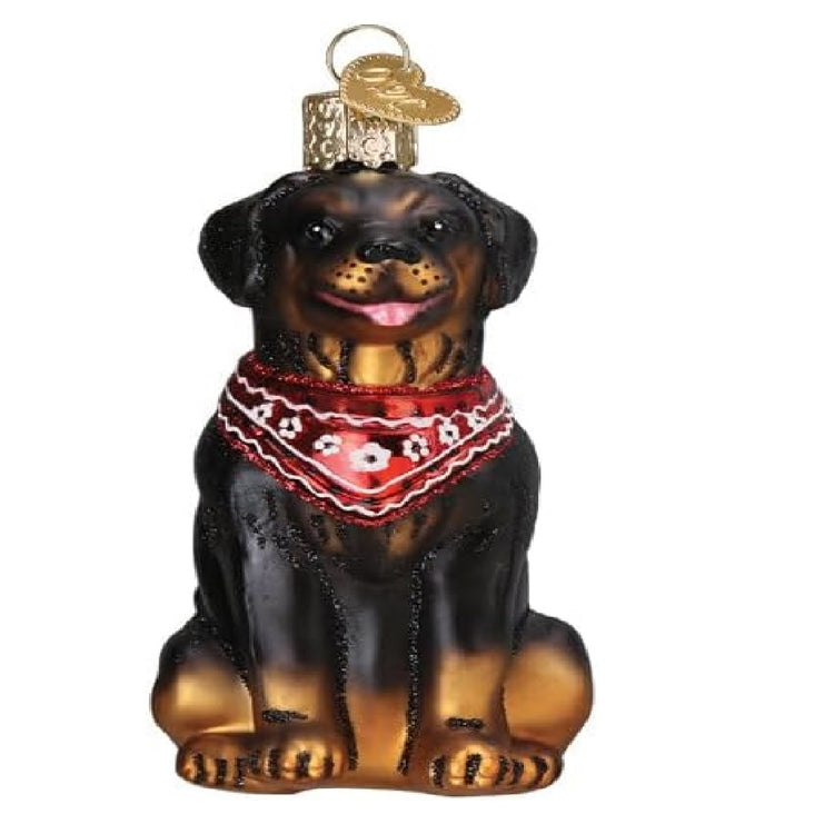 blown glass rottweiler dog ornament, he's wearing a red bandana.