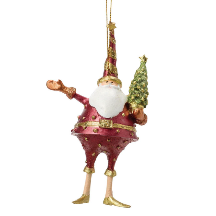 Decorative Christmas ornament of Santa holding a tree on a white background
