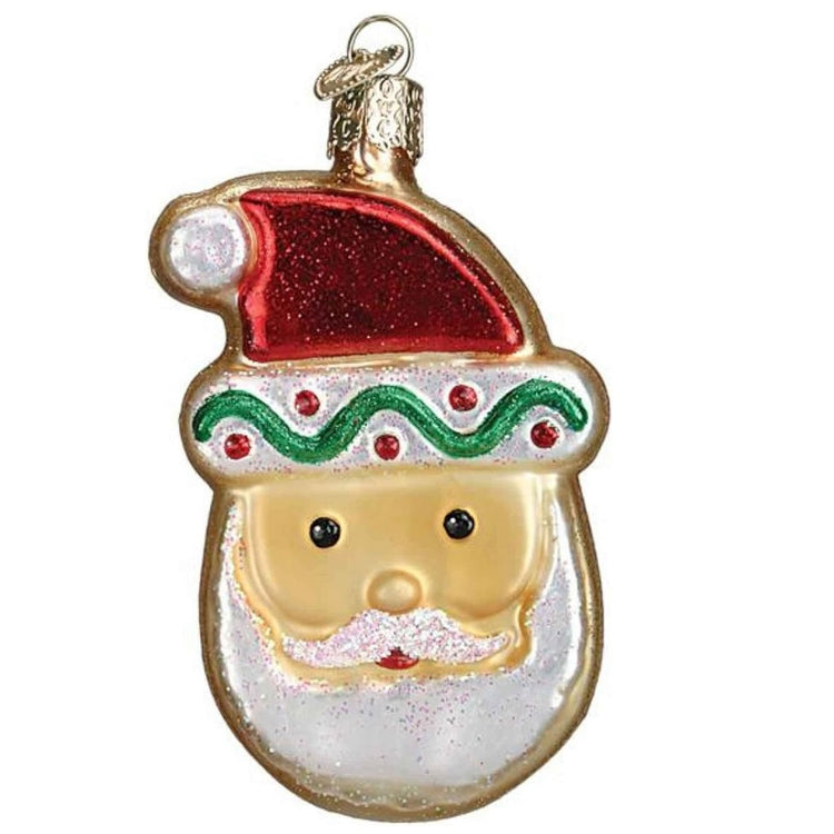 Blown glass ornament of a santa claus shaped sugar cookie.