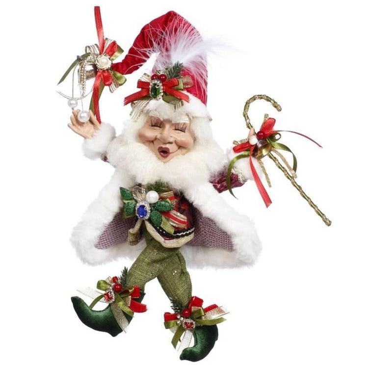 bearded elf wearing green suit with white fur coat, red santa hat and holding a gold candy cane.