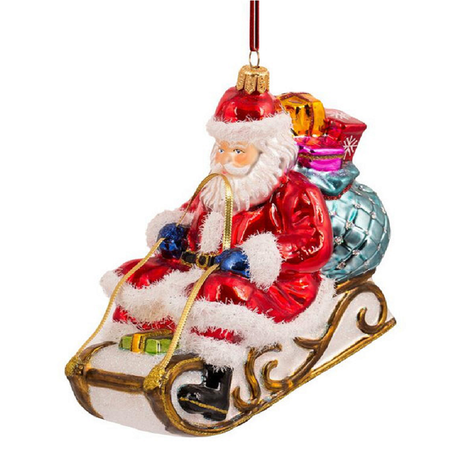 Blown glass Ornament, Santa on a sled.